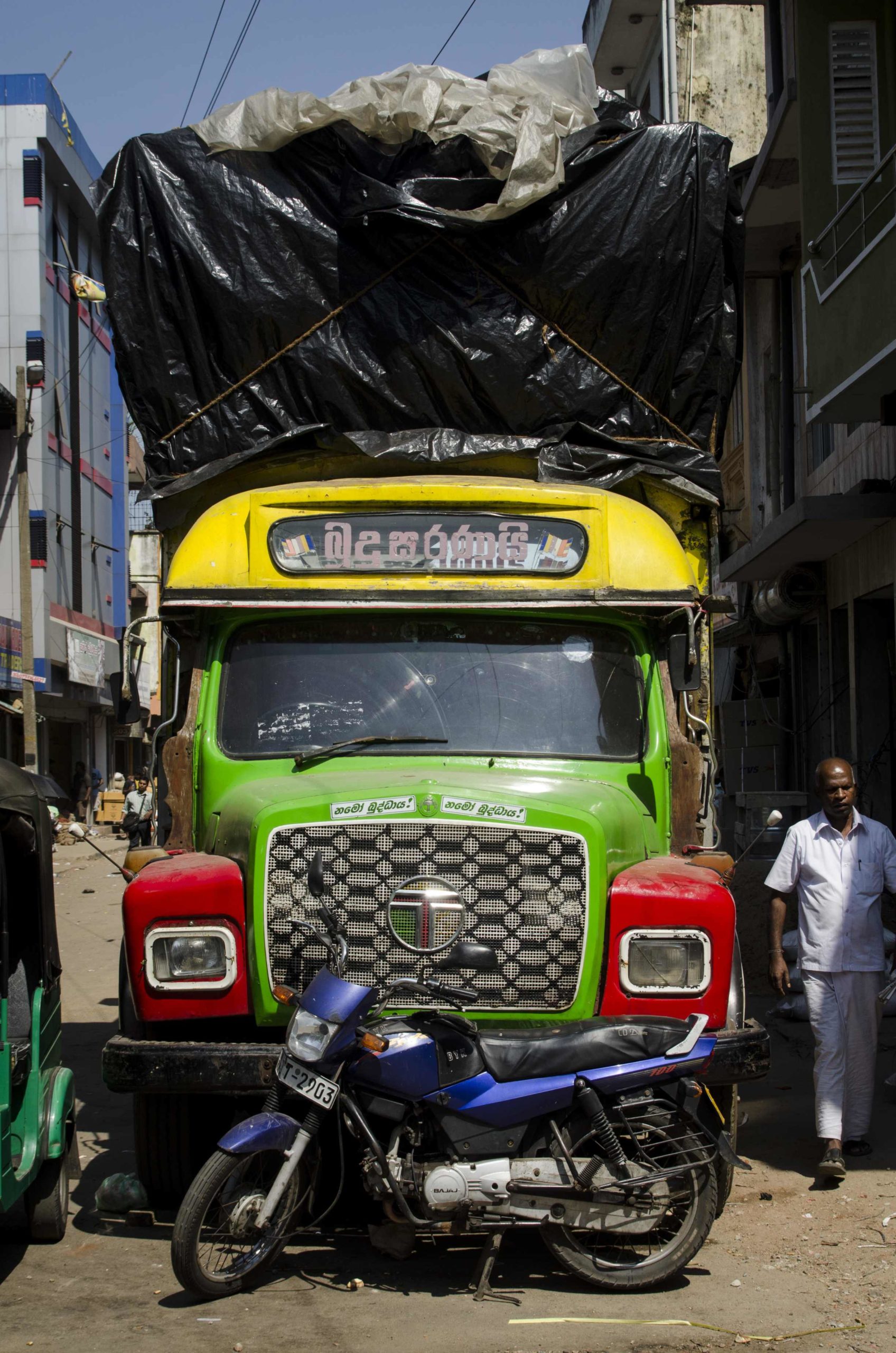 Visiting Sri Lanka: A colored and overloaded bus