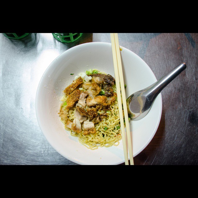 Chiang Mai Travel Blog - Crispy pork and handmade #noodles, with a bit of thick soy sauce at the bottom. And as many chillies as you want.