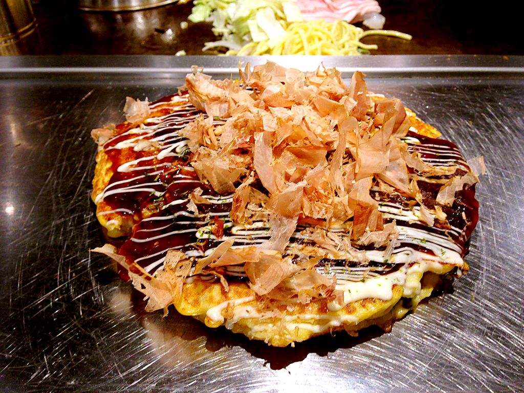 A cooked Okonomiyaki savory pancake in Osaka