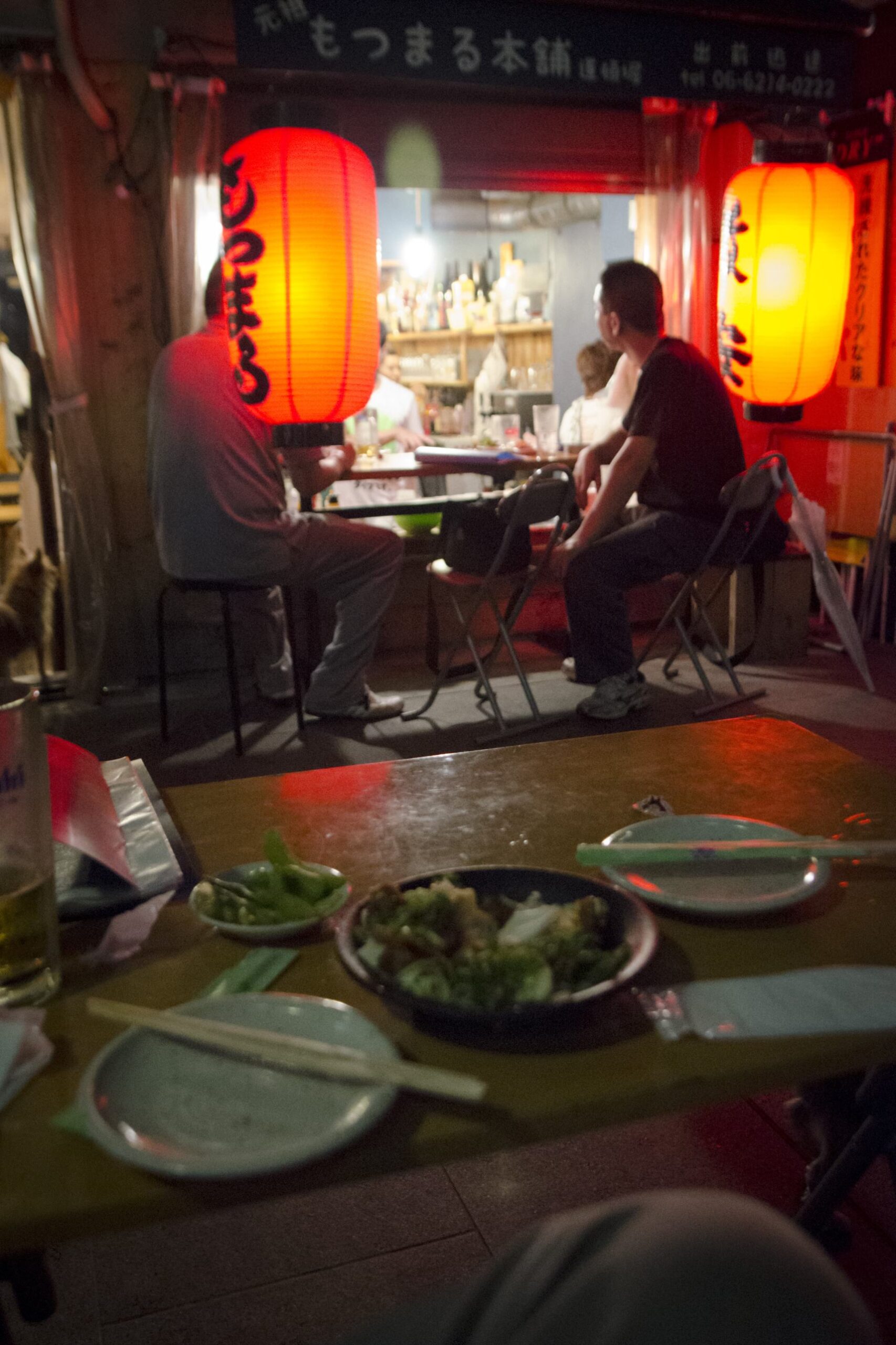 People gathering and socializing at an Izakaya