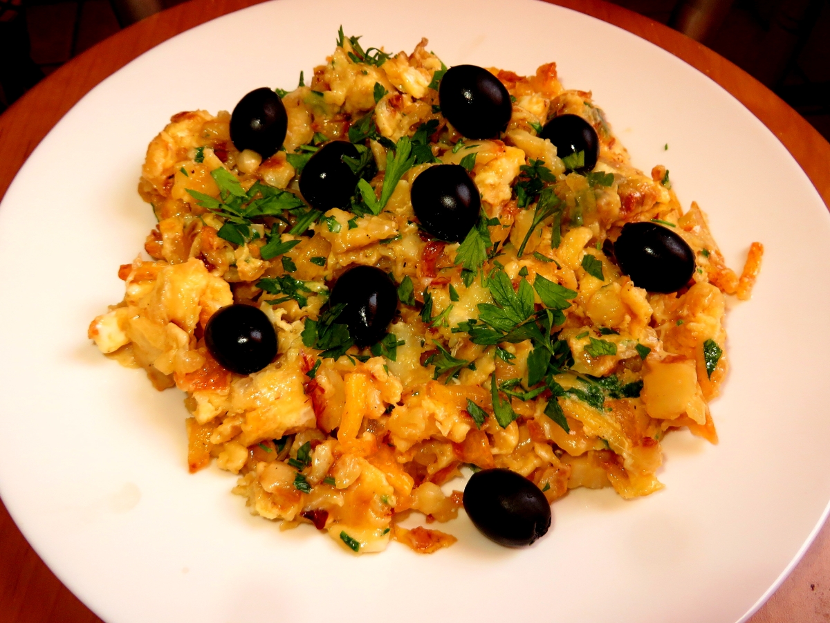 A plate of Bacalhau a Bras salt cod in Lisbon