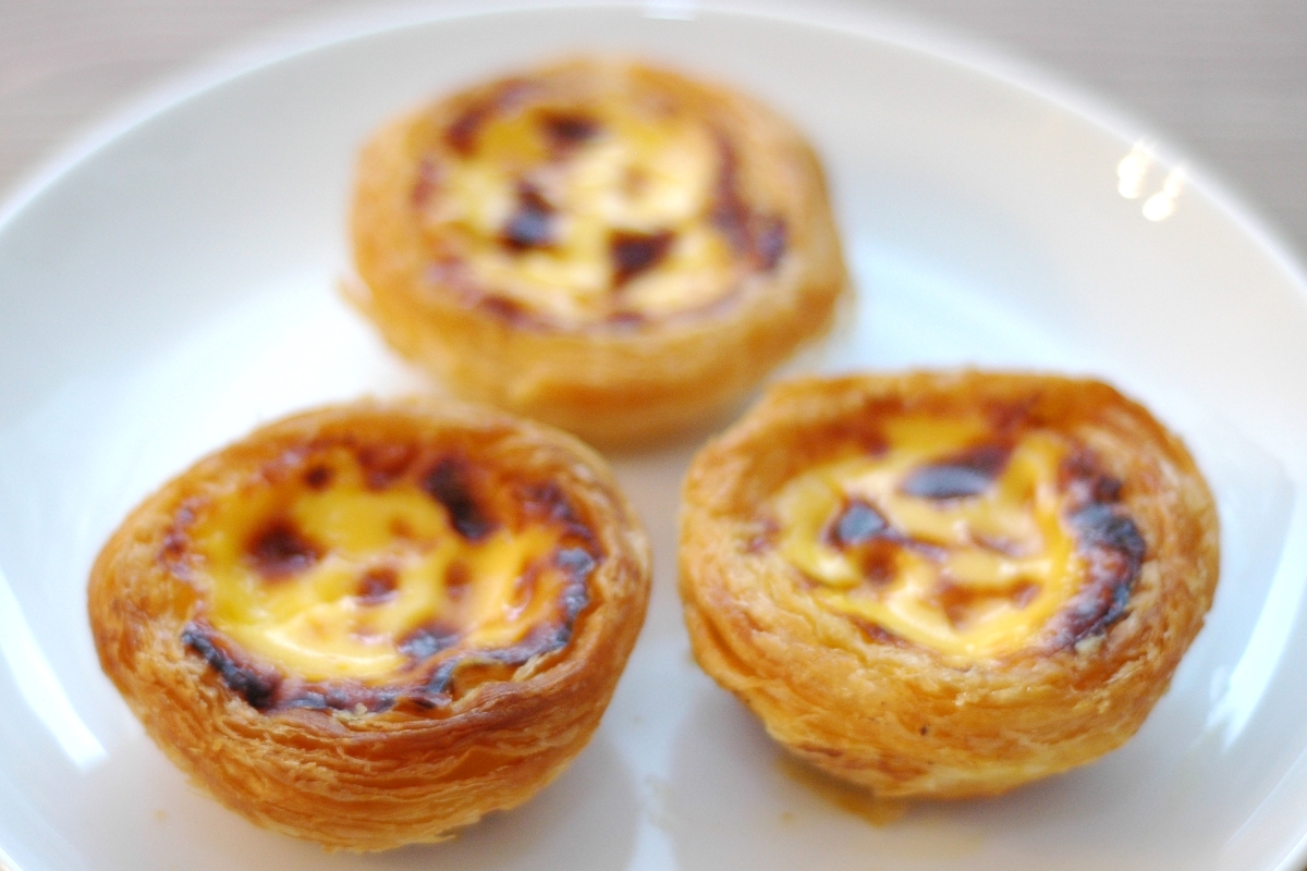 A traditional Portuguese Pasteis de Nata egg tart in Lisbon