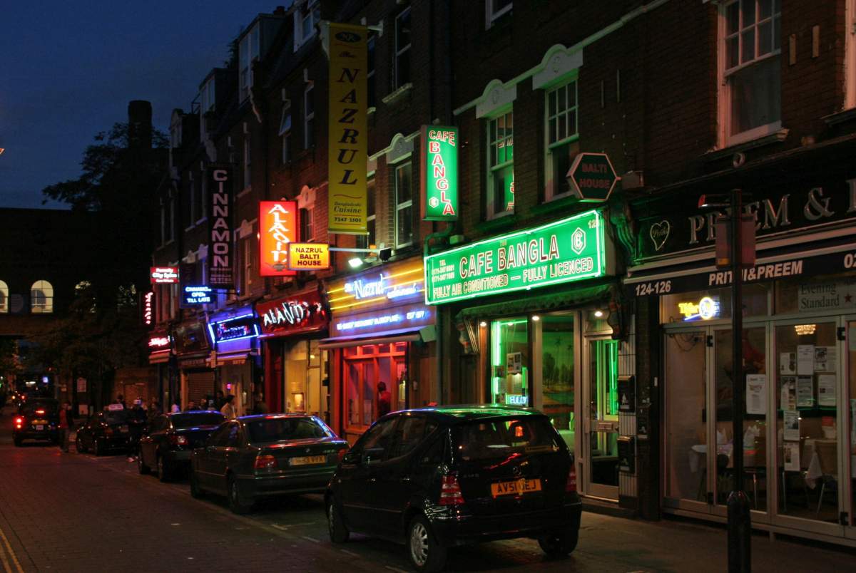 Exterior view of curry shops located on Brick Lane in London