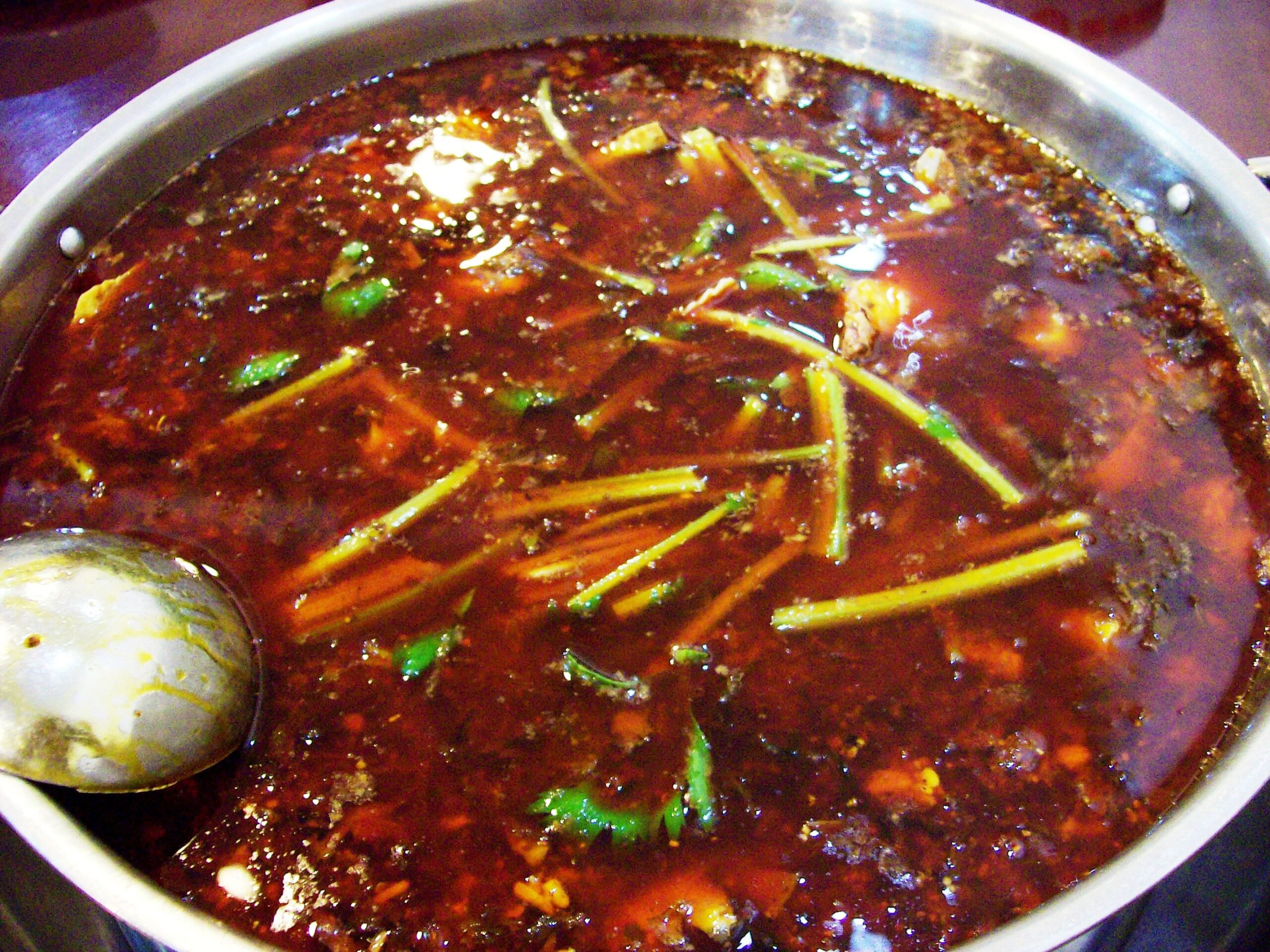 Pot of Sichuan hotpot boiling
