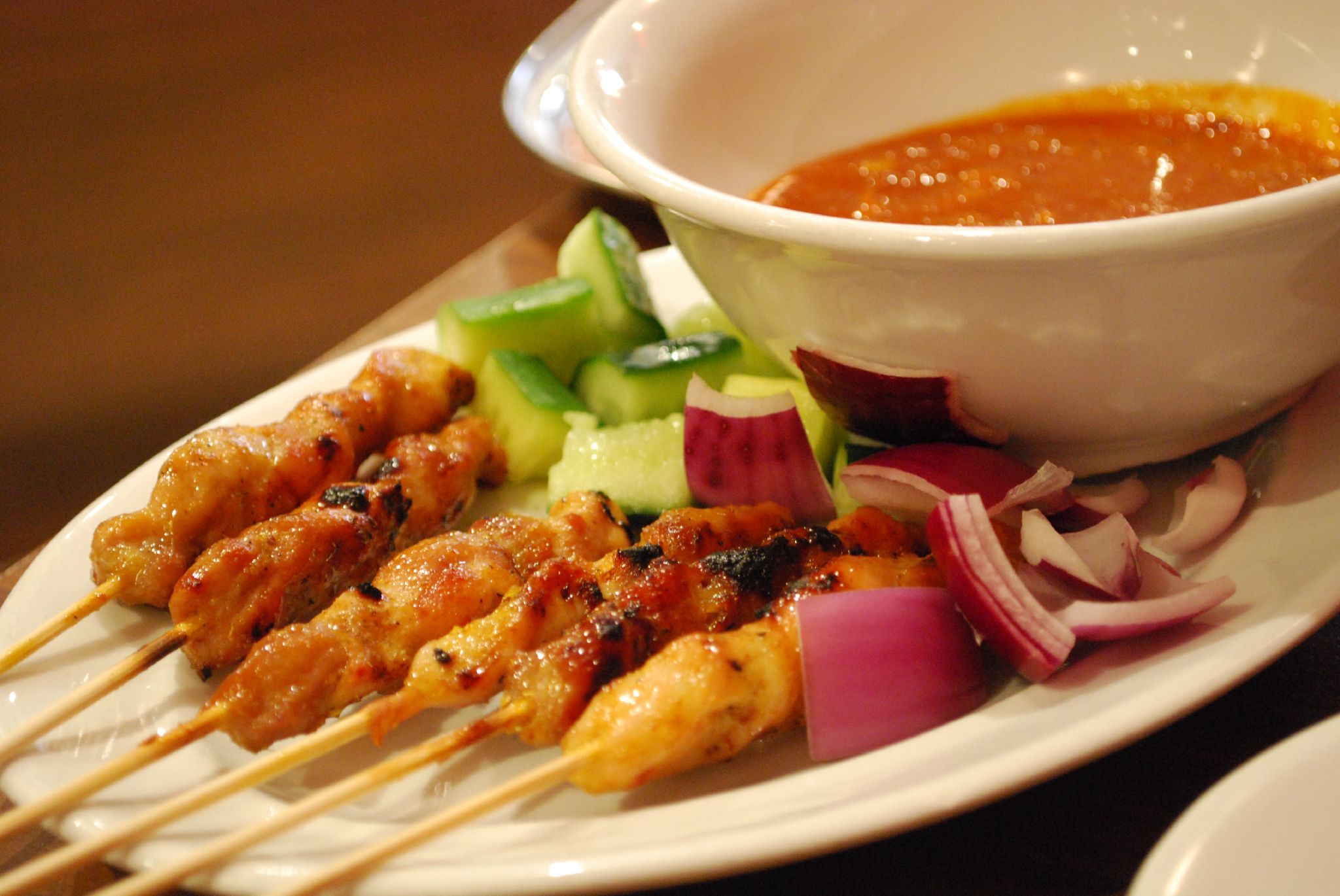 Grilled chopped marinated meat on a stick