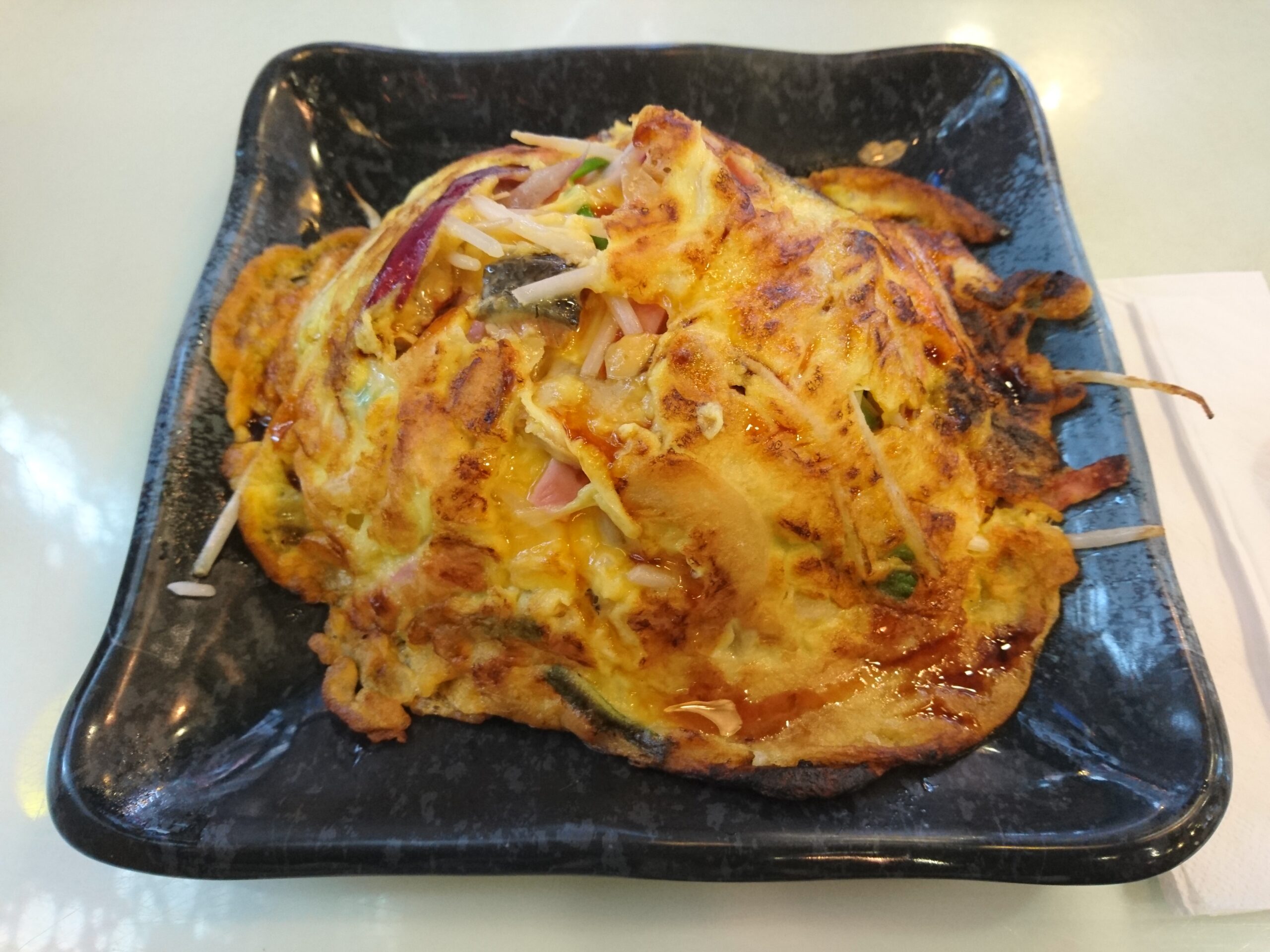 Andrew Zimmern Bizarre Foods Delicious Destinations San Francisco - Egg foo young - photo by Ceeseven under CC BY-SA 4.0