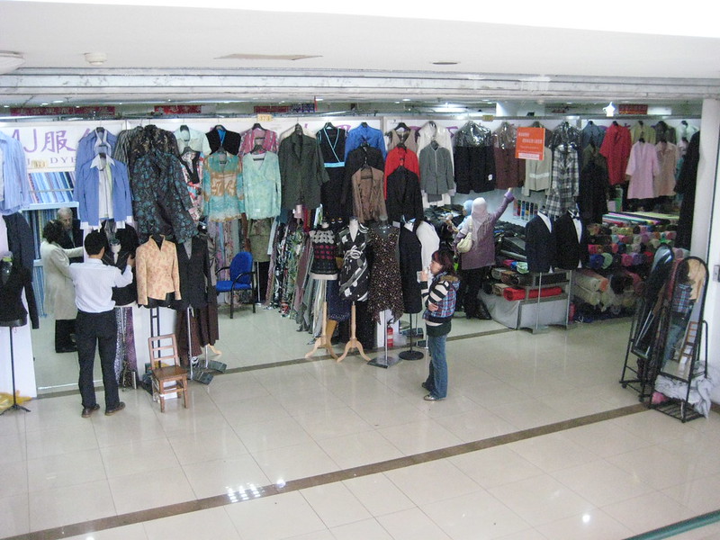 garments sold at the Fabric Market in Shanghai - photo by jwalsh under CC BY 2.0