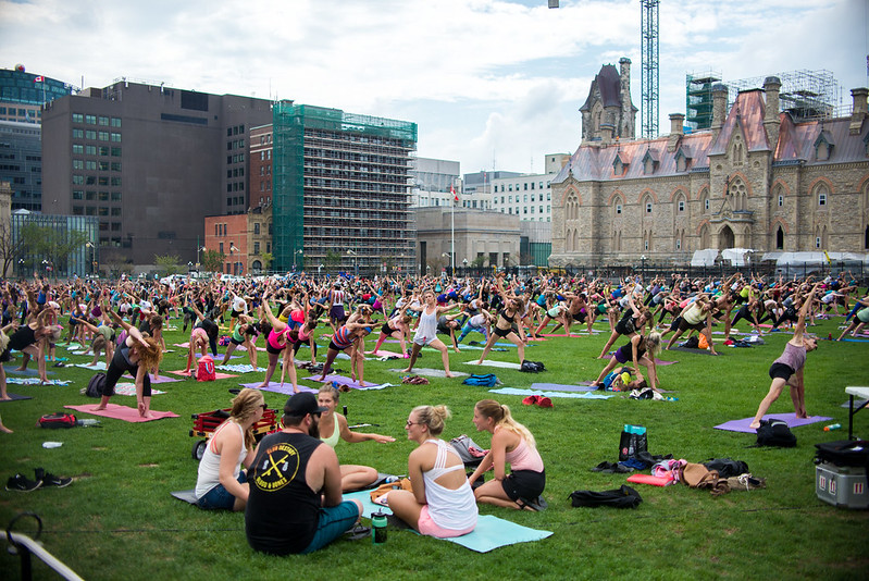 free things to do in Ottawa - summer yoga in the Parliament Hill grounds - photo by David D under CC BY 2.0