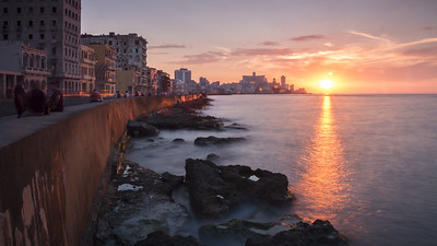 Malecón sunset - photo by kuhnmi under CC BY 2.0