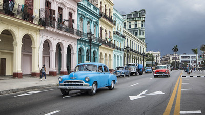 three days in Havana - typical Cuban cars in front of a colorful facade at Paseo de Martí - photo by kuhnmi under CC BY 2.0