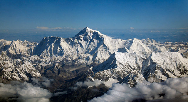 Mount Everest as seen from an aircraft from airline company Drukair in Bhutan - photo by Mount_Everest_as_seen_from_Drukair2.jpg: shrimpo1967, derivative work: Papa Lima Whiskey 2 under CC BY-SA 2.0 