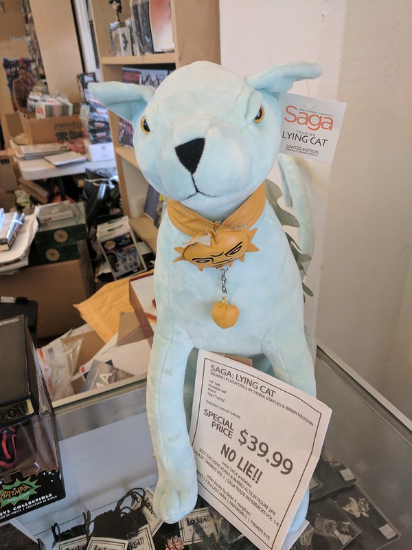 Saga's Lying Cat plushie on display at Comickaze Comics Books and More - photo by Cory Doctorow under CC BY-SA 2.0