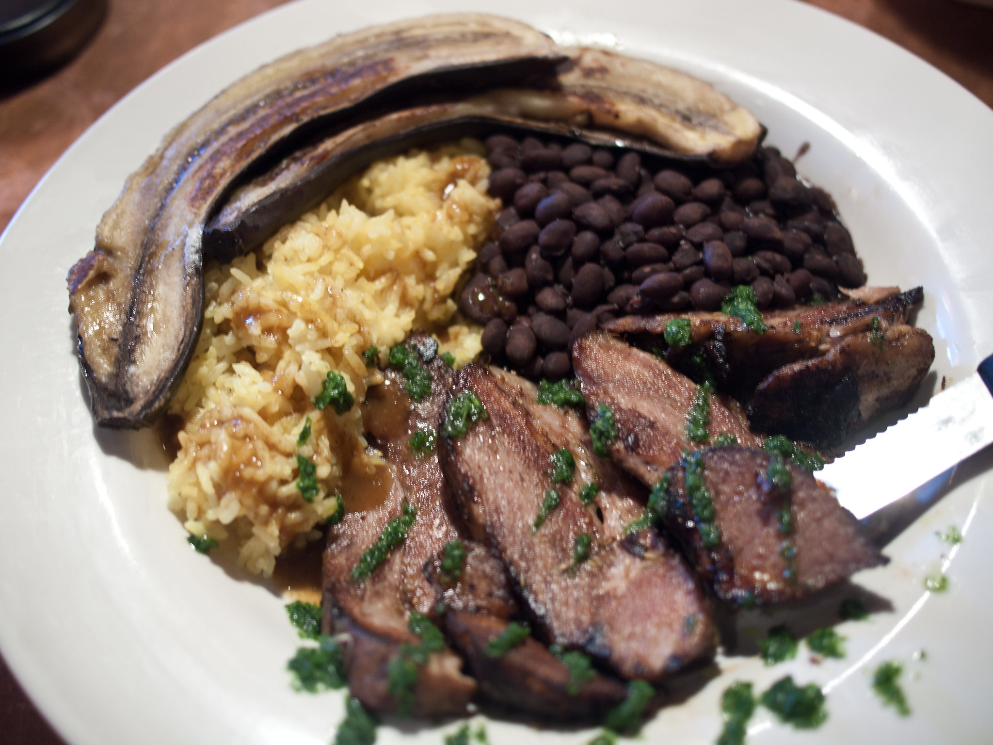 Anthony Bourdain Cuba - Cuban Pork with Black Beans and Rice - photo by Edsel Little under CC BY-SA 2.0