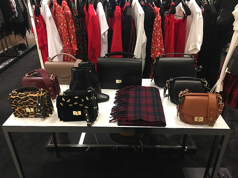 Bags designed by Emily Ratajkowski for The Kooples, on display at Bloomingdale's at 900 North Michigan Shops - photo by TonyTheTiger under CC-BY-SA-4.0