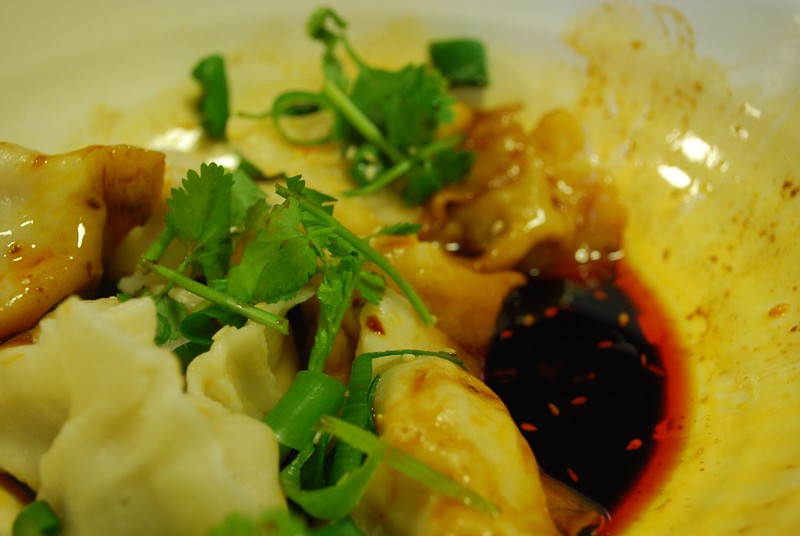 Anthony Bourdain Chicago - Pork Dumplings with Chili Sauce - photo by Alpha under CC BY-SA 2.0