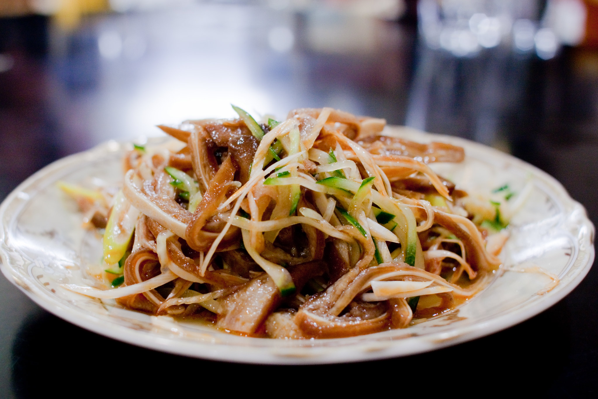Anthony Bourdain Pacific Northwest - Pig's ear and cucumber salad - photo by Yoko Nekonomania under CC BY 2.0
