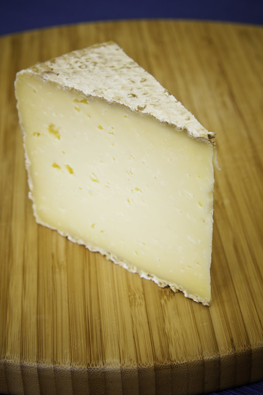 Cave-aged Cheddar - photo from USDA Photo by Bob Nichols under CC BY 2.0